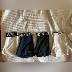 Nike Pro Women's Compression Shorts in Black, Navy, and White